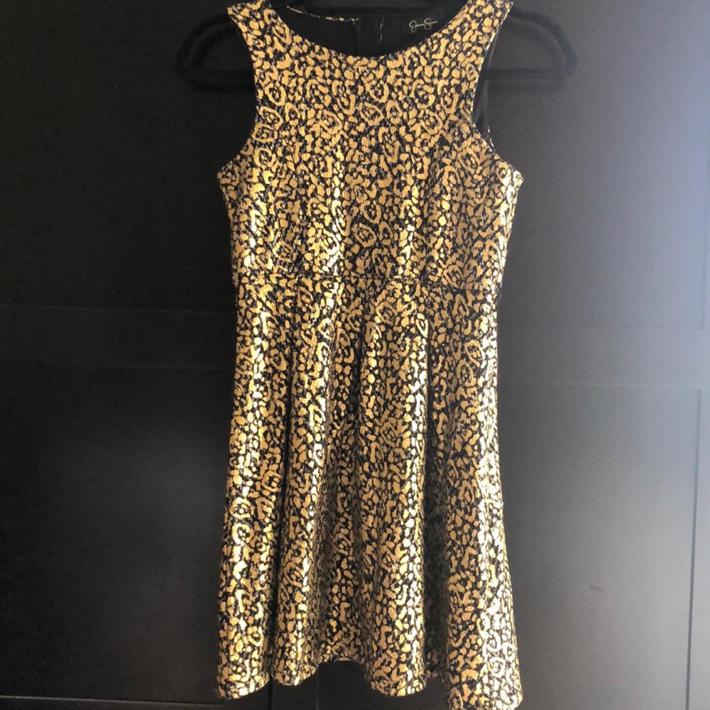 Fancy metallic gold and black dress.
